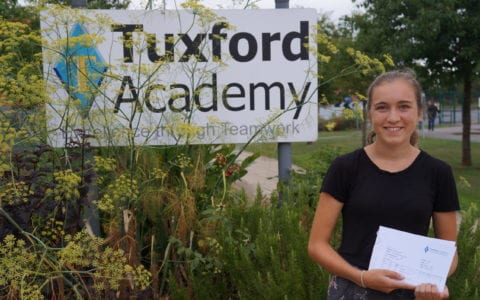 Tuxford Academy students celebrating as 100% pass A Levels