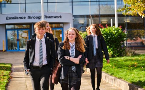 students leaving main entrance