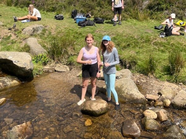 Girls by river