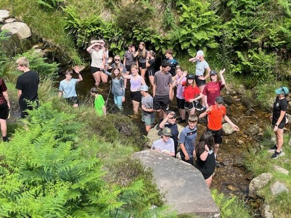 students in river