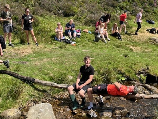students relaxing in Edale