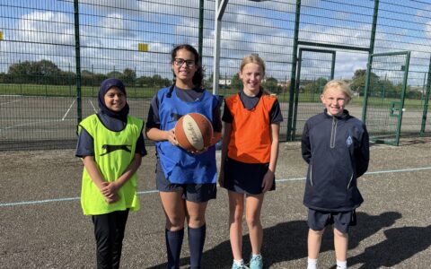group of year 7 girls with basketball