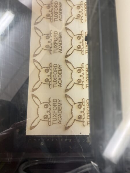 laser printed tuxford logo