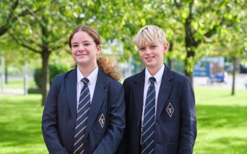 girls and boy student outside