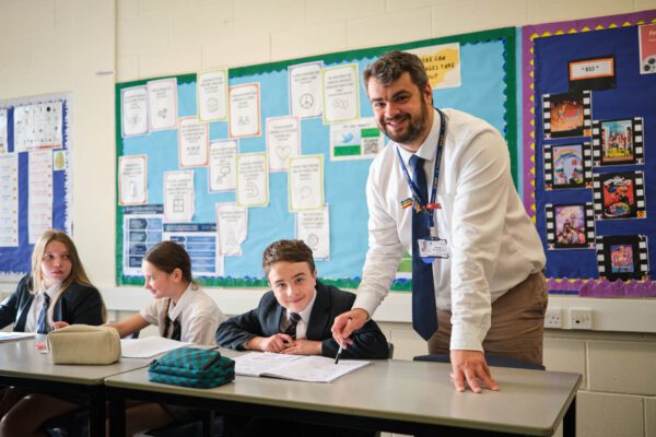 MFL teacher with student